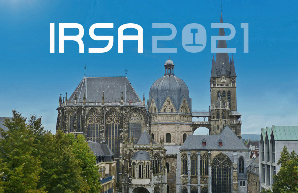 IRSA Logo vor dem Hintergrund des Aachener Doms